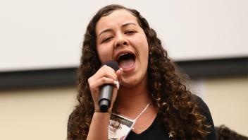 Student singing at the Equity Summit